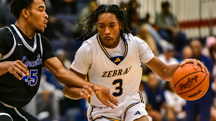Wayne Memorial's Carlos Medlock drives to the basket during the second annual Rocket Hoop Classic on Saturday, Dec. 16, 2023, at Westland John Glenn.
