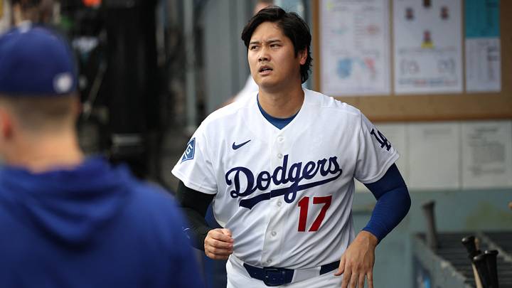 Sep 7, 2026; Los Angeles, California, USA; Los Angeles Dodgers designated hitter Shohei Ohtani (17) looks on in the dugout after hitting a fly ball to left field for an out against Cincinnati Reds starting pitcher Chase Burns (not pictured) during the first inning at Dodger Stadium. Mandatory Credit: Kiyoshi Mio-Imagn Images Sep 7, 2026; Los Angeles, California, USA; Los Angeles Dodgers designated hitter Shohei Ohtani (17) looks on in the dugout after hitting a fly ball to left field for an out against Cincinnati Reds starting pitcher Chase Burns (not pictured) during the first inning at Dodger Stadium. Mandatory Credit: Kiyoshi Mio-Imagn Images