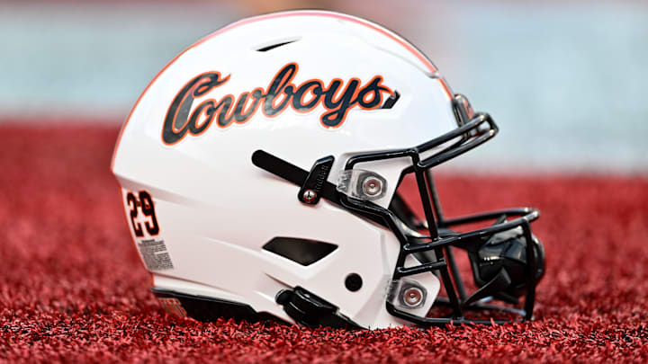 Nov 18, 2023; Houston, Texas, USA; A detailed view of an Oklahoma State Cowboys helmet on the sideline of the game against the Houston Cougars at TDECU Stadium. Mandatory Credit: Maria Lysaker-Imagn Images Nov 18, 2023; Houston, Texas, USA; A detailed view of an Oklahoma State Cowboys helmet on the sideline of the game against the Houston Cougars at TDECU Stadium. Mandatory Credit: Maria Lysaker-Imagn Images