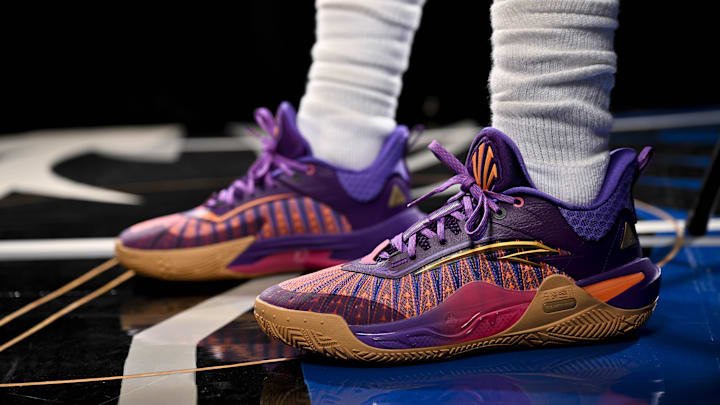 Sep 30, 2024; Dallas, TX, USA; A view of the shoes of Dallas Mavericks guard Kyrie Irving (11) as he poses for a photo during the 2024 Dallas Mavericks media day. Mandatory Credit: Jerome Miron-Imagn Images