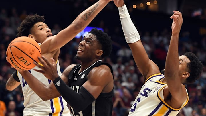 Mar 14, 2024; Nashville, TN, USA; Mississippi State Bulldogs guard Josh Hubbard (13) attempts a shot