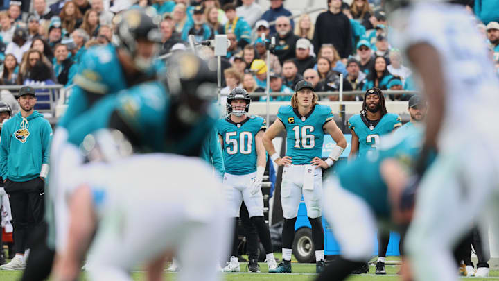 Jan 4, 2026; Jacksonville, Florida, USA; Jacksonville Jaguars quarterback Trevor Lawrence (16) watches game play from the sideline against the Tennessee Titans during the fourth quarter at EverBank Stadium. Mandatory Credit: Morgan Tencza-Imagn Images Jan 4, 2026; Jacksonville, Florida, USA; Jacksonville Jaguars quarterback Trevor Lawrence (16) watches game play from the sideline against the Tennessee Titans during the fourth quarter at EverBank Stadium. Mandatory Credit: Morgan Tencza-Imagn Images