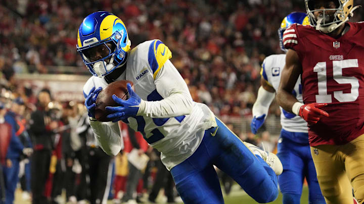 Dec 12, 2024; Santa Clara, California, USA; Los Angeles Rams cornerback Darious Williams (24) intercepts the pass intended for San Francisco 49ers wide receiver Jauan Jennings (15) during the fourth quarter at Levi's Stadium. Mandatory Credit: Kelley L Cox-Imagn Images