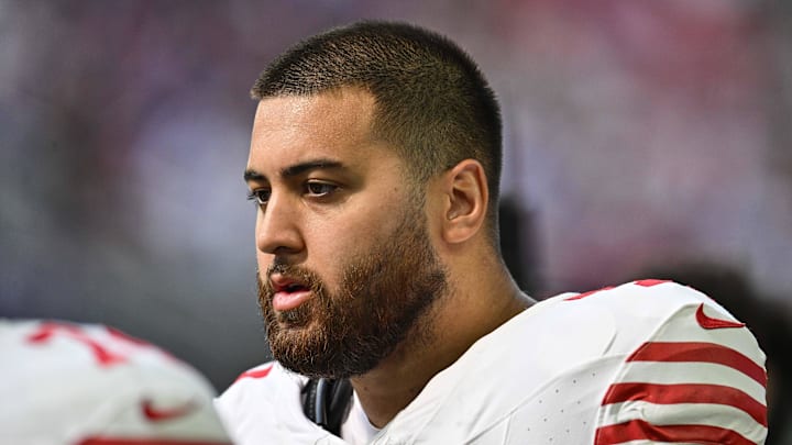 Sep 15, 2024; Minneapolis, Minnesota, USA; San Francisco 49ers guard Dominick Puni (77) looks on during the game against the Minnesota Vikings at U.S. Bank Stadium. Mandatory Credit: Jeffrey Becker-Imagn Images