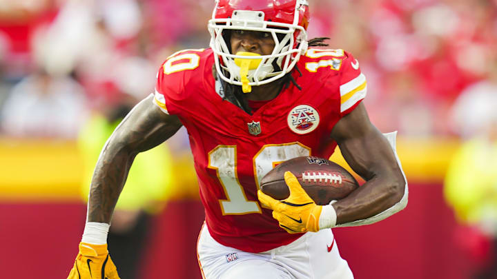 Sep 15, 2024; Kansas City, Missouri, USA; Kansas City Chiefs running back Isiah Pacheco (10) runs the ball during the first half against the Cincinnati Bengals at GEHA Field at Arrowhead Stadium. Mandatory Credit: Jay Biggerstaff-Imagn Images