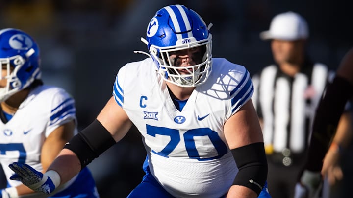 Nov 23, 2024; Tempe, Arizona, USA; Brigham Young Cougars offensive lineman Connor Pay (70) against the Arizona State Sun Devils at Mountain America Stadium. Mandatory Credit: Mark J. Rebilas-Imagn Images