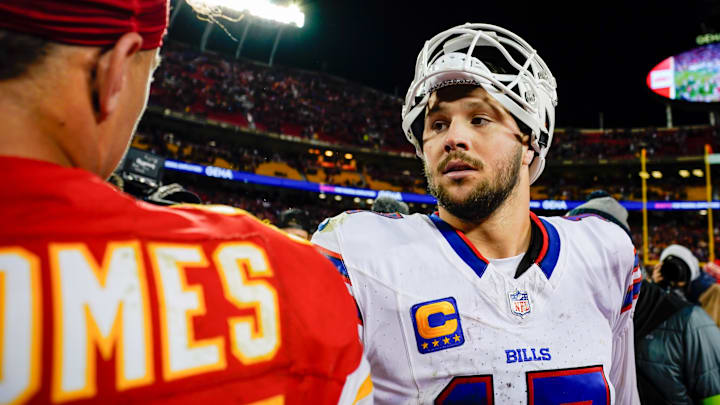 Dec 10, 2023; Kansas City, Missouri, USA; Buffalo Bills quarterback Josh Allen (17) talks with Kansas City Chiefs quarterback Patrick Mahomes (15) after a game  at GEHA Field at Arrowhead Stadium. Mandatory Credit: Jay Biggerstaff-Imagn Images