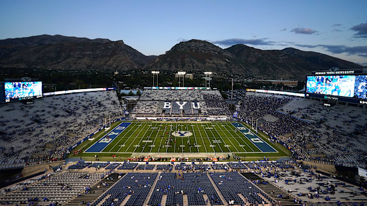 The Cincinnati Bearcats and the Brigham Young Cougars warm up prior to a college football game between the Brigham Young Cougars and the Cincinnati Bearcats, Friday, Sept. 29, 2023, at LaVell Edwards Stadium in Provo, Utah.