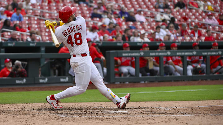 Apr 2, 2025; St. Louis, Missouri, USA;  St. Louis Cardinals catcher Ivan Herrera (48) hits a two run home run for his second home run of the game against the Los Angeles Angels during the sixth inning at Busch Stadium. Mandatory Credit: Jeff Curry-Imagn Images