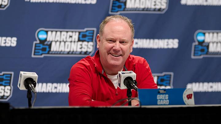 Mar 18, 2026; Portland, OR, USA; Wisconsin Badgers head coach Greg Gard answers questions from the media before a practice session ahead of the first round of the men's 2026 NCAA Tournament at Moda Center. Mandatory Credit: Troy Wayrynen-Imagn Images