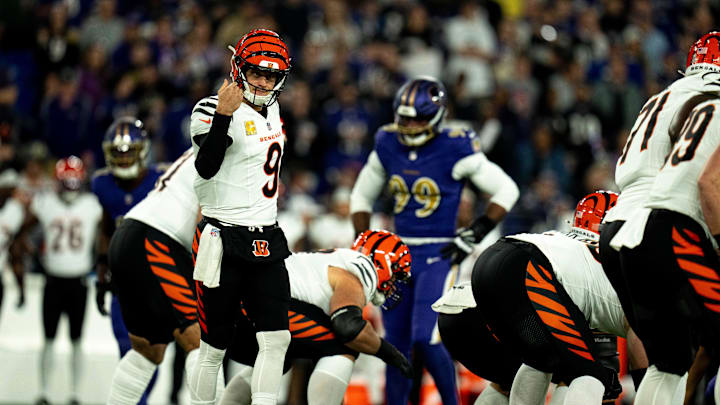 Cincinnati Bengals quarterback Joe Burrow (9) communicates with his team in the first quarter of the NFL game against the Baltimore Ravens at M&T Banks Stadium in Baltimore on Thursday, Nov. 7, 2024.