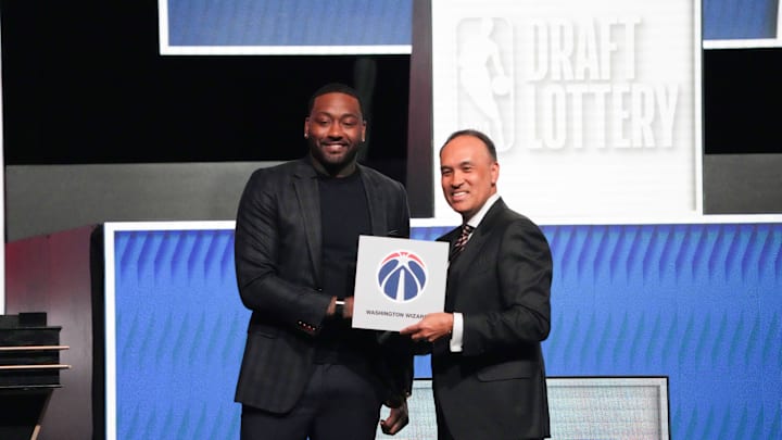 Former Washington Wizards guard John Wall and NBA deputy commissioner Mark Tatum after the Wizards won the draft lottery. Former Washington Wizards guard John Wall and NBA deputy commissioner Mark Tatum after the Wizards won the draft lottery.