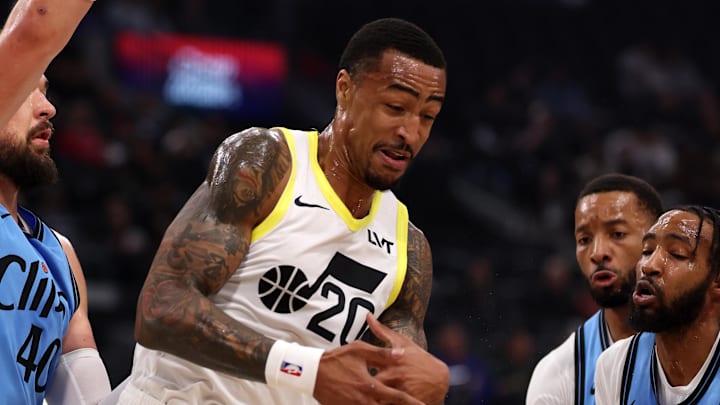 Nov 17, 2024; Inglewood, California, USA;  Utah Jazz forward John Collins (20) loses the ball while driving to the basket during the first quarter against the Los Angeles Clippers at Intuit Dome. Mandatory Credit: Kiyoshi Mio-Imagn Images