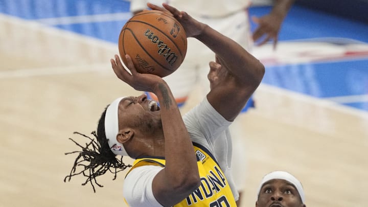 Jun 16, 2025; Oklahoma City, Oklahoma, USA; Indiana Pacers center Myles Turner (33) shoots against Oklahoma City Thunder guard Shai Gilgeous-Alexander (2) during the first quarter of game five of the 2025 NBA Finals at Paycom Center. Mandatory Credit: Kyle Terada-Imagn Images