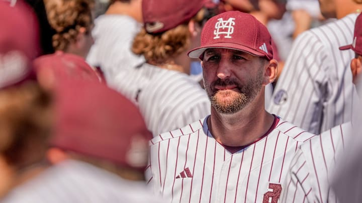 Mississippi State interim head coach Justin Parker walks in the dugout between innings of the game with Texas A&M in the first round of the SEC Baseball Tournament at the Hoover Met.
