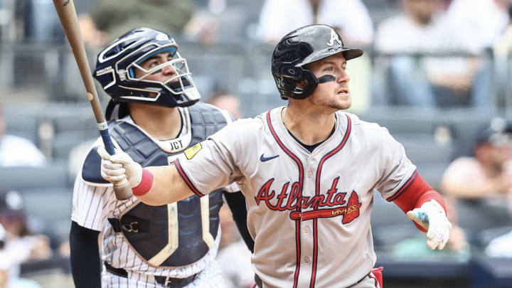 Jun 23, 2024; Bronx, New York, USA;  Atlanta Braves center fielder Jarred Kelenic (24) hits a solo home run in the third inning against the New York Yankees at Yankee Stadium. 