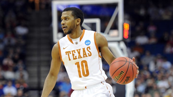 Mar 18, 2011; Tulsa, OK, USA; Texas Longhorns guard Jai Lucas (10) brings the ball up court against the Oakland Golden Grizzlies in the second half during the second round of the 2011 NCAA men's basketball tournament at the BOK Center.