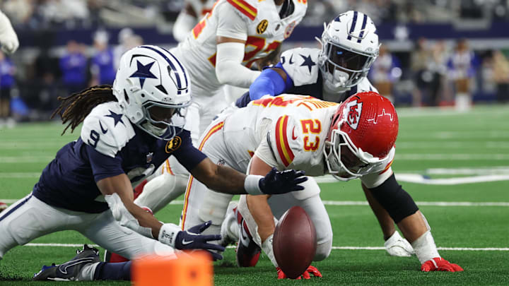 Nov 27, 2025; Arlington, Texas, USA; Dallas Cowboys wide receiver KaVontae Turpin (9) and Kansas City Chiefs linebacker Drue Tranquill (23) look to recover a fumble during the fourth quarter at AT&T Stadium. Mandatory Credit: Kevin Jairaj-Imagn Images