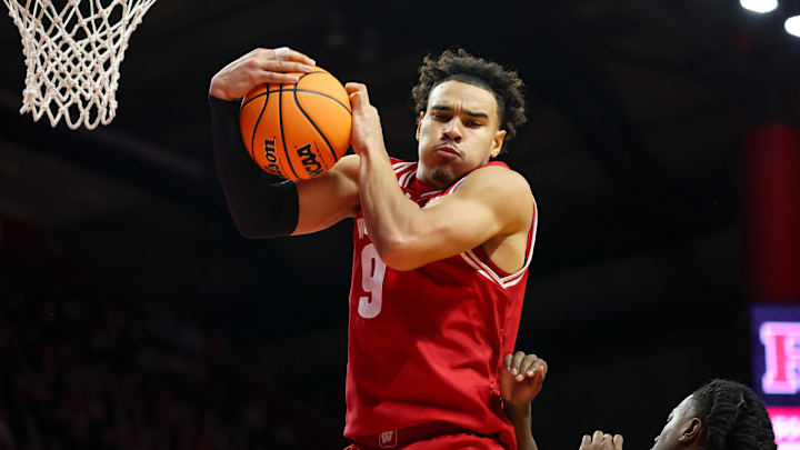 Jan 6, 2025; Piscataway, New Jersey, USA; Wisconsin Badgers guard John Tonje (9) rebounds during the second half against the Rutgers Scarlet Knights at Jersey Mike's Arena. Mandatory Credit: Vincent Carchietta-Imagn Images