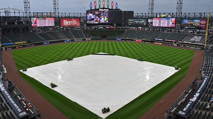 Jul 30, 2025; Chicago, Illinois, USA; A general view of the tarp during a rain delay before a game against the Philadelphia Phillies and the Chicago White Sox at Rate Field. Mandatory Credit: Patrick Gorski-Imagn Images