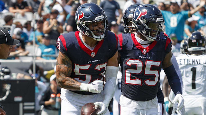Sep 24, 2023; Jacksonville, Florida, USA; Houston Texans linebacker Blake Cashman (53) and safety Grayland Arnold (25) celebrate a fumble recovery against the Jacksonville Jaguars during the second quarter at EverBank Stadium. Mandatory Credit: Morgan Tencza-Imagn Images