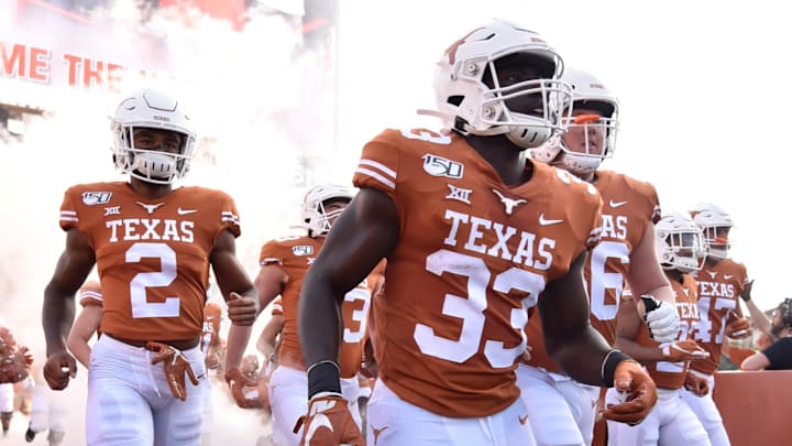 Sep 7, 2019; Austin, TX, USA; Texas Longhorns linebacker and running back David Gbenda (33) takes the field.