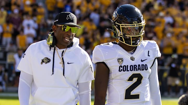 Oct 7, 2023; Tempe, Arizona, USA; Colorado Buffaloes head coach Deion Sanders with son and quarterback Shedeur Sanders (2) against the Arizona State Sun Devils at Mountain America Stadium. Mandatory Credit: Mark J. Rebilas-Imagn Images Oct 7, 2023; Tempe, Arizona, USA; Colorado Buffaloes head coach Deion Sanders with son and quarterback Shedeur Sanders (2) against the Arizona State Sun Devils at Mountain America Stadium. Mandatory Credit: Mark J. Rebilas-Imagn Images