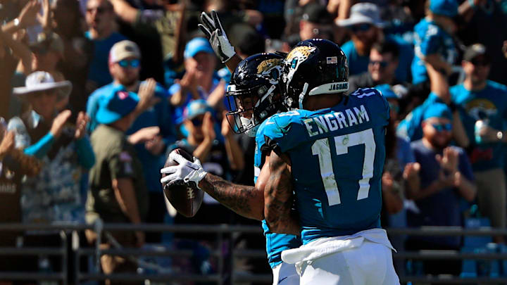 Jacksonville Jaguars tight end Brenton Strange (85) is celebrated by tight end Evan Engram (17) for his first career touchdown score during the third quarter of an NFL football matchup Sunday, Oct. 15, 2023 at EverBank Stadium in Jacksonville, Fla. The Jacksonville Jaguars defeated the Indianapolis Colts 37-20. [Corey Perrine/Florida Times-Union]