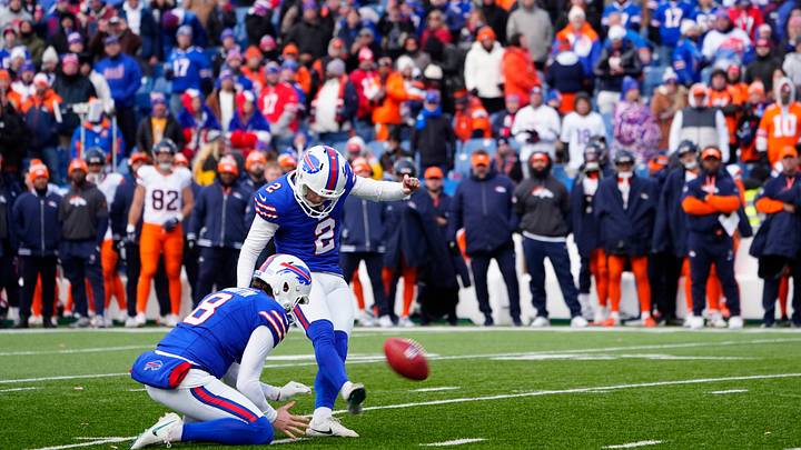 Jan. 12, 2025; Orchard Park, New York, USA; Buffalo Bills kicker Tyler Bass (2) kicks an extra-point try during the fourth quarter of a past AFC wild-card game against the Denver Broncos at the old Highmark Stadium. Mandatory Credit: Gregory Fisher-Imagn Images Jan. 12, 2025; Orchard Park, New York, USA; Buffalo Bills kicker Tyler Bass (2) kicks an extra-point try during the fourth quarter of a past AFC wild-card game against the Denver Broncos at the old Highmark Stadium. Mandatory Credit: Gregory Fisher-Imagn Images