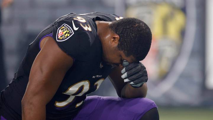 Oct 11, 2021; Baltimore, Maryland, USA; Baltimore Ravens defensive end Calais Campbell (93 )kneels in the end zone prior to the Ravens' game against the Indianapolis Colts at M&T Bank Stadium. Mandatory Credit: Geoff Burke-USA TODAY Sports