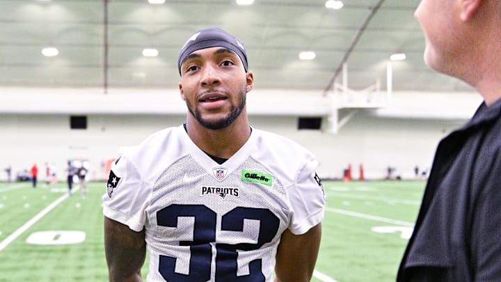 Jun 10, 2025; Foxborough, MA, USA; New England Patriots running back TreVeyon Henderson (32) speaks to the media after minicamp held in the WIN Field House at Gillette Stadium. Mandatory Credit: Eric Canha-Imagn Images
