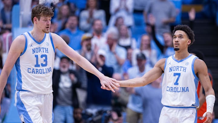 Mar 3, 2026; Chapel Hill, North Carolina, USA; North Carolina Tar Heels center Henri Veesaar (13) celebrates with guard Seth Trimble (7) during the second half against the Clemson Tigers at Dean E. Smith Center. Mandatory Credit: Scott Kinser-Imagn Images