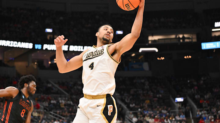 Purdue Boilermakers forward Trey Kaufman-Renn (4) grabs a rebound.