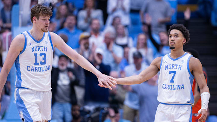 Mar 3, 2026; Chapel Hill, North Carolina, USA; North Carolina Tar Heels center Henri Veesaar (13) celebrates with guard Seth Trimble (7) during the second half against the Clemson Tigers at Dean E. Smith Center. Mandatory Credit: Scott Kinser-Imagn Images