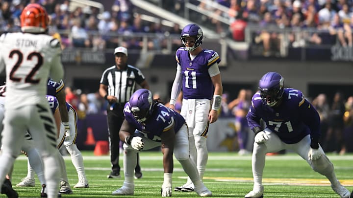 Sep 21, 2025; Minneapolis, Minnesota, USA; Minnesota Vikings quarterback Carson Wentz (11) walks up to the line of scrimmage during the first half against the Cincinnati Bengals at U.S. Bank Stadium. Mandatory Credit: Jeffrey Becker-Imagn Images