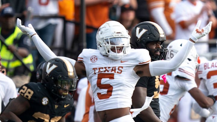 Texas Longhorns defensive back Malik Muhammad (5) celebrates a Vanderbilt stop during the first half of their game at FirstBank Stadium in Nashville, Tenn., Saturday, Oct. 26, 2024.