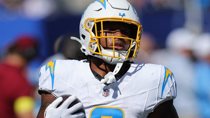 Sep 28, 2025; East Rutherford, New Jersey, USA; Los Angeles Chargers running back Omarion Hampton (8) warms up before the game against the New York Giants at MetLife Stadium. 