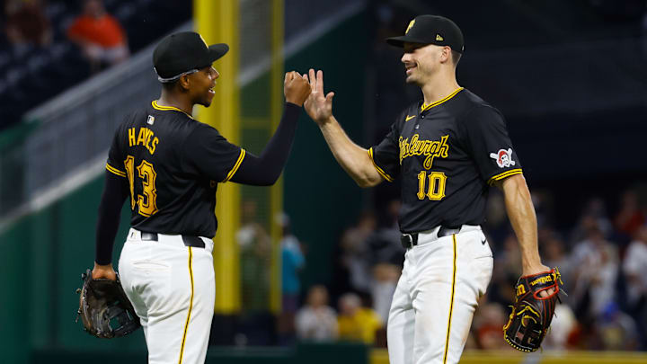 Pittsburgh Pirates stars Bryan Reynolds and Ke'Bryan Hayes celebrate a victory.