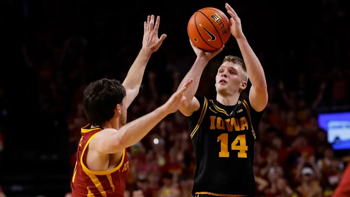 Iowa Hawkeyes guard Bennett Stirtz rises up for a shot against the Iowa State Cyclones Iowa Hawkeyes guard Bennett Stirtz rises up for a shot against the Iowa State Cyclones