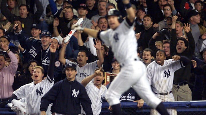 Yankees players celebrate Scott Brosius' home run in game 5 of the 2001 World Series