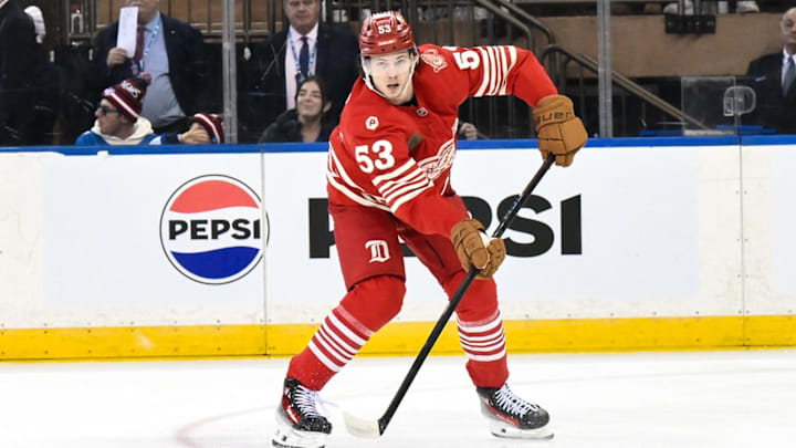 Nov 16, 2025; New York, New York, USA; Detroit Red Wings defenseman Moritz Seider (53) looks to pass the puck against the New York Rangers during the first period at Madison Square Garden. Mandatory Credit: John Jones-Imagn Images