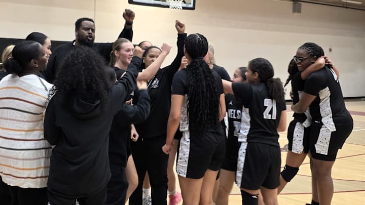 Nelson celebrates earning its first state tournament berth after beating Southridge.