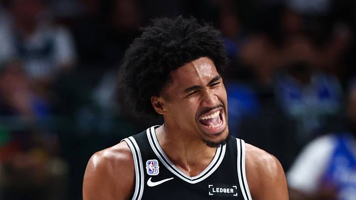 Oct 22, 2025; Dallas, Texas, USA;  San Antonio Spurs guard Dylan Harper (2) reacts during the game against the Dallas Mavericks at American Airlines Center. Mandatory Credit: Kevin Jairaj-Imagn Images