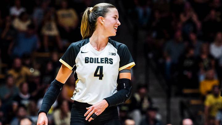 Kenna Wollard smiles during a Purdue volleyball match. Kenna Wollard smiles during a Purdue volleyball match.