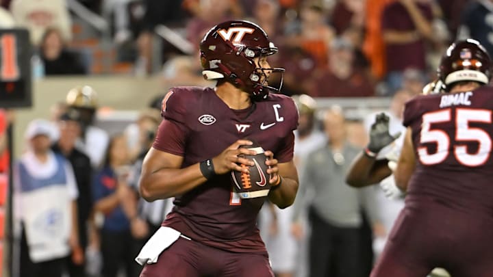 Sep 6, 2025; Blacksburg, Va.; Virginia Tech quarterback Kyron Drones (1) looks to pass the ball during the fourth quarter. Sep 6, 2025; Blacksburg, Va.; Virginia Tech quarterback Kyron Drones (1) looks to pass the ball during the fourth quarter.