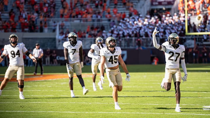 Demon Deacon defense celebrates after play against Virginia Tech Demon Deacon defense celebrates after play against Virginia Tech