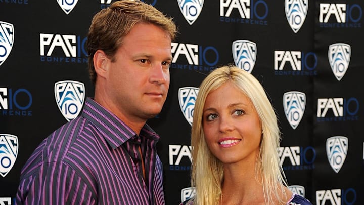 Jul 29, 2010; Los Angeles, CA, USA; Then Southern California Trojans coach Lane Kiffin (left) and wife Layla Kiffin (right) at the Fox Sports-Pacific-10 Conference Hollywood Premiere Night at the 20th Century Fox studios.