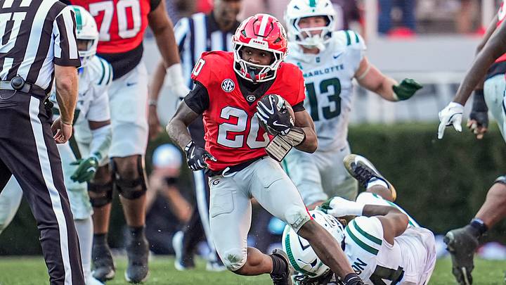 Nov 22, 2025; Athens, Georgia, USA; Georgia Bulldogs running back Dwight Phillips Jr. (20) runs against the Charlotte 49ers during the second half at Sanford Stadium. Mandatory Credit: Dale Zanine-Imagn Images