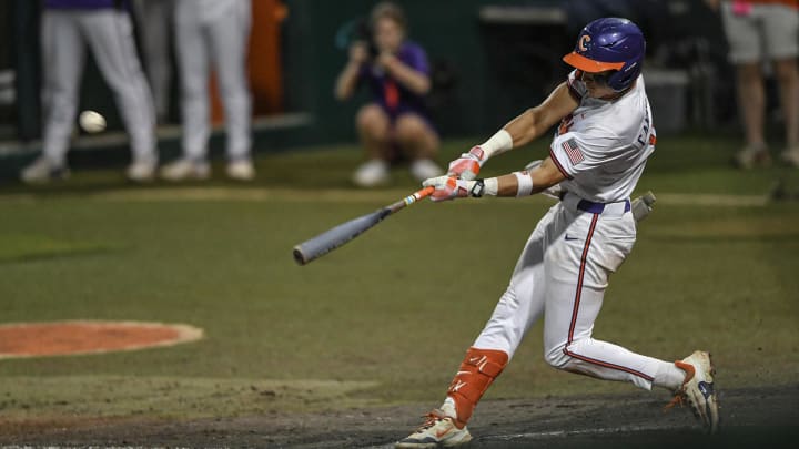 Jun 2, 2024; Clemson, South Carolina, USA; Clemson sophomore Cam Cannarella (10) hits a home run against Coastal Carolina University during the bottom of the eighth inning of the NCAA baseball Clemson Regional at Doug Kingsmore Stadium in Clemson. 