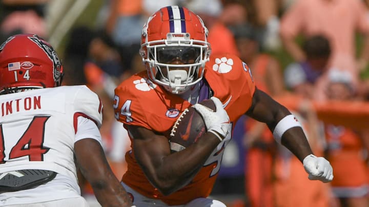 Sep 21, 2024; Clemson, South Carolina, USA; Clemson Tigers running back David Eziomume (24) runs the North Carolina State Wolfpack during the fourth quarter at Memorial Stadium. Mandatory Credit: Ken Ruinard-Imagn Images